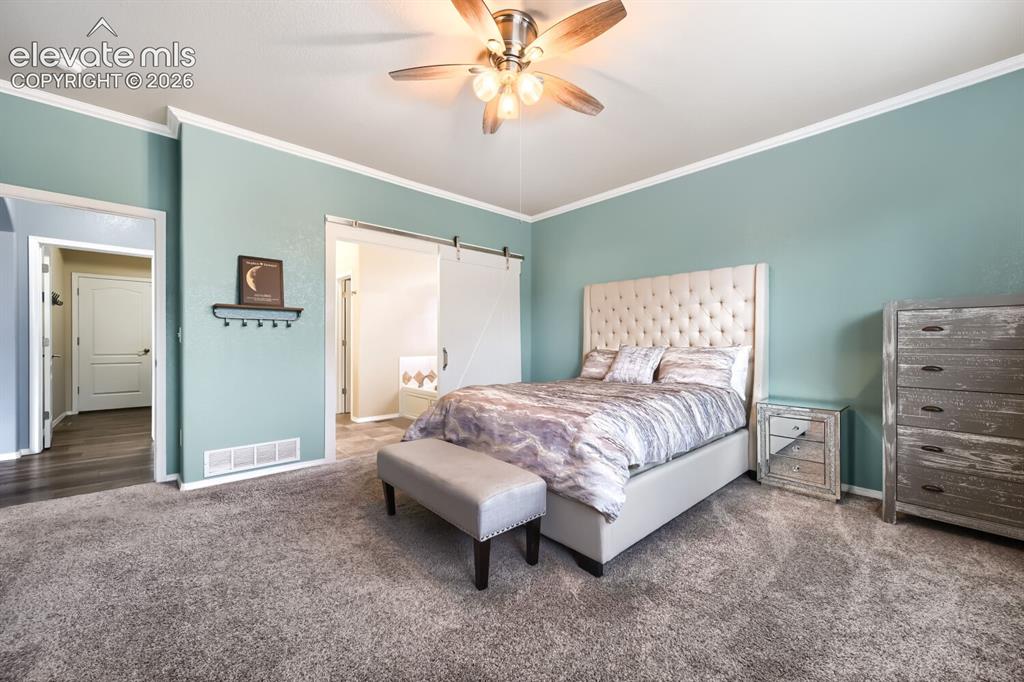 Image 12 of 30: Master Bedroom