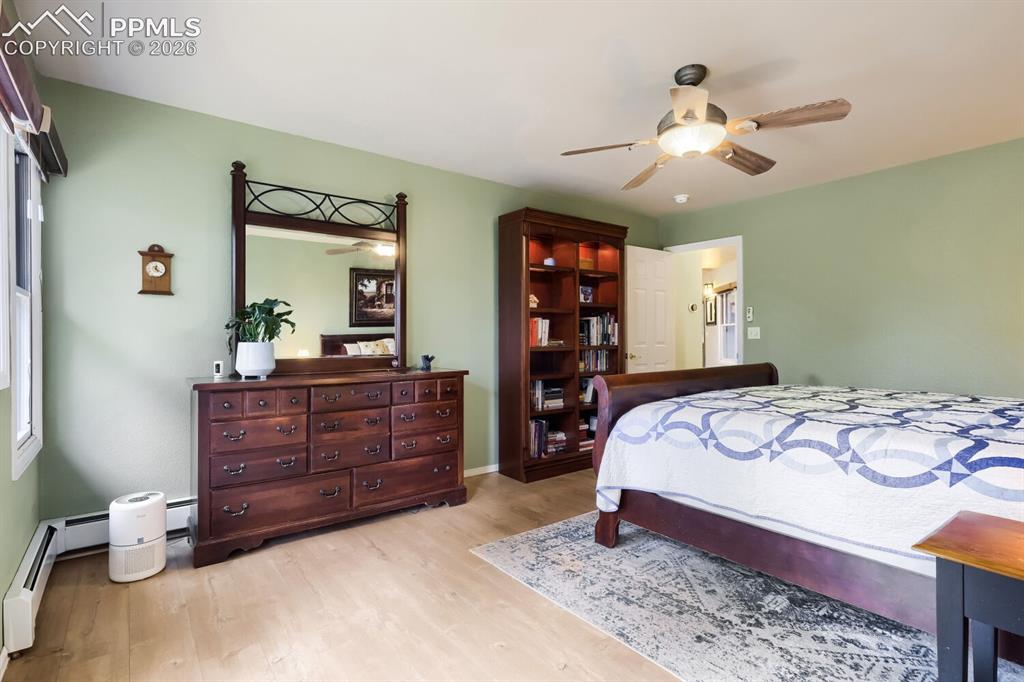 Image 17 of 50: Runs length of the home overlooking large ranch