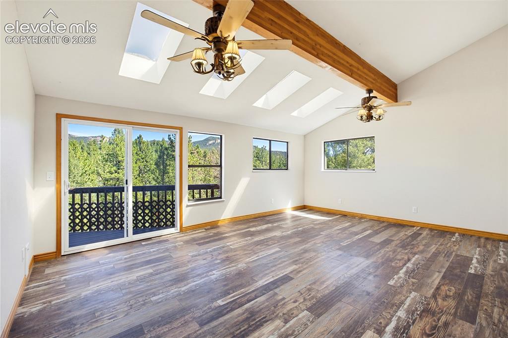 Image 26 of 47: Skylights and walk out to the Deck