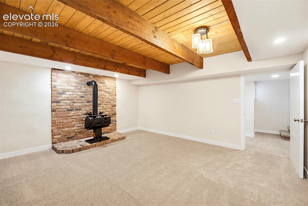 Image 34 of 47: New Carpet, basement level Living Area
