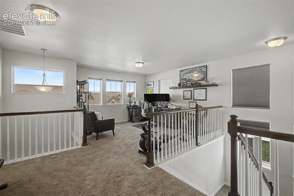 Image 18 of 45: The versatile loft may be used in any way you need... exercise room, playro