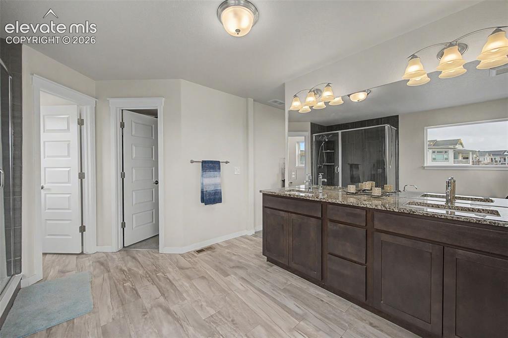Image 28 of 45: This primary bath is so spacious!