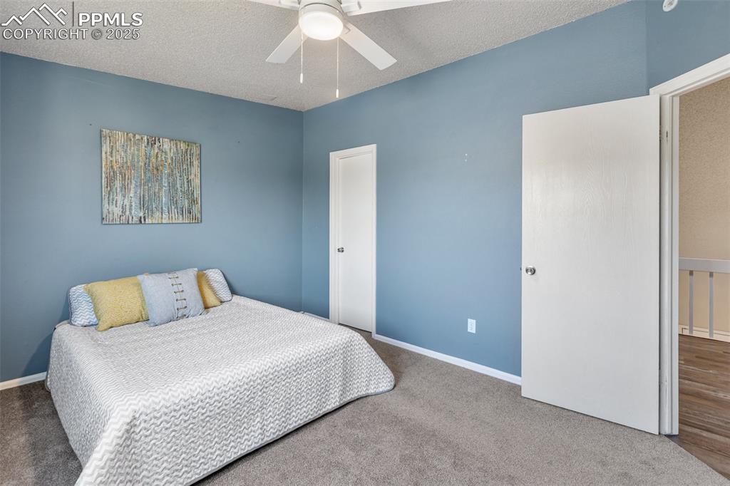 Image 23 of 26: Upper Level Bedroom