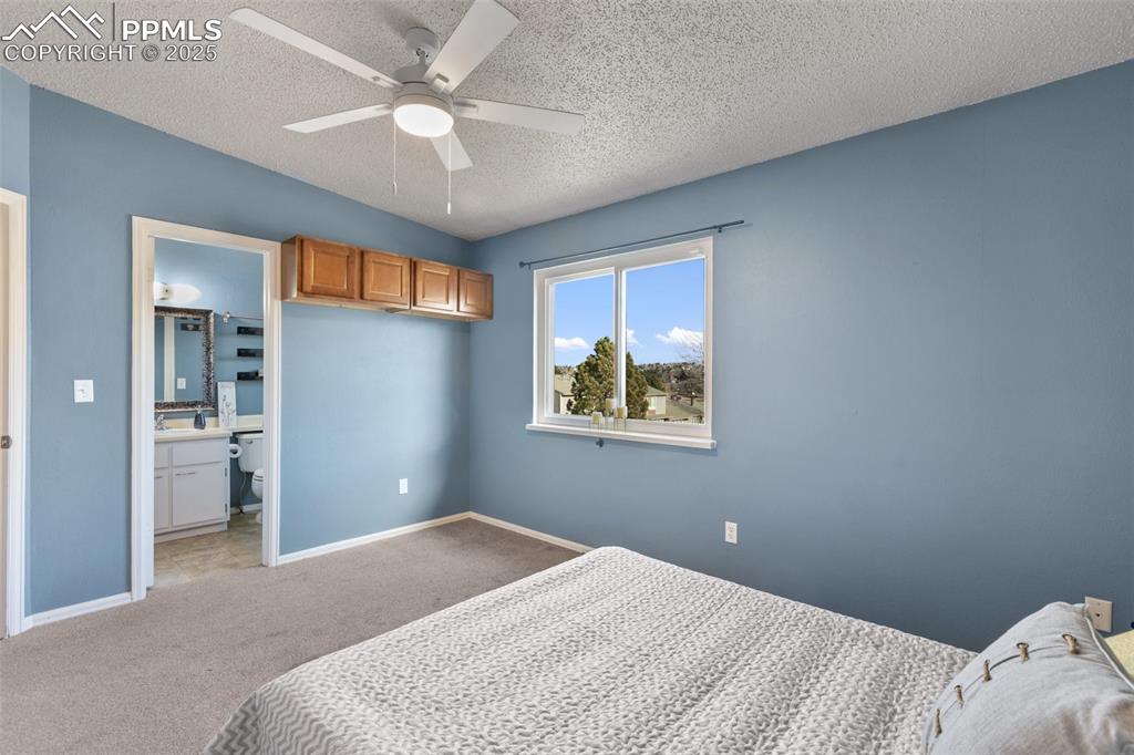 Image 24 of 26: Upper Level Bedroom