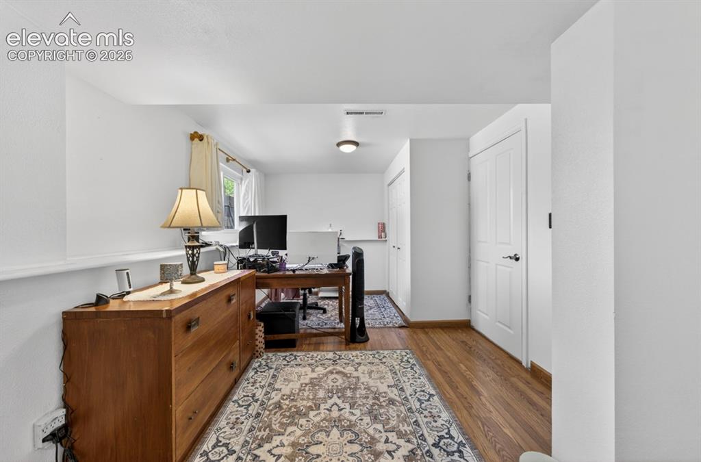 Image 20 of 42: Basement- Office/Sitting Area in Primary Bedroom- Bright interior space fea