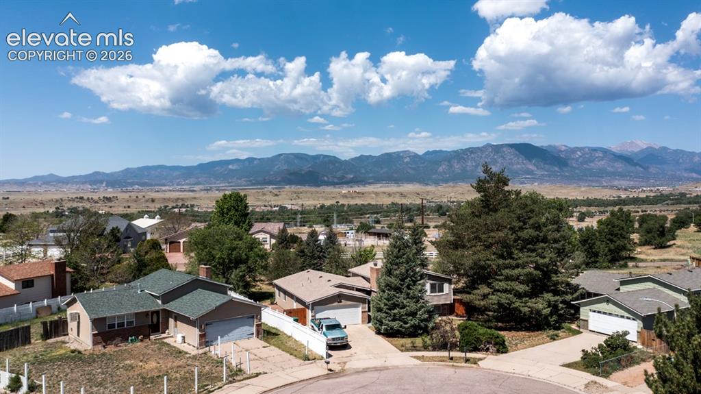 Image 36 of 42: Residential properties featuring mountain scenery
