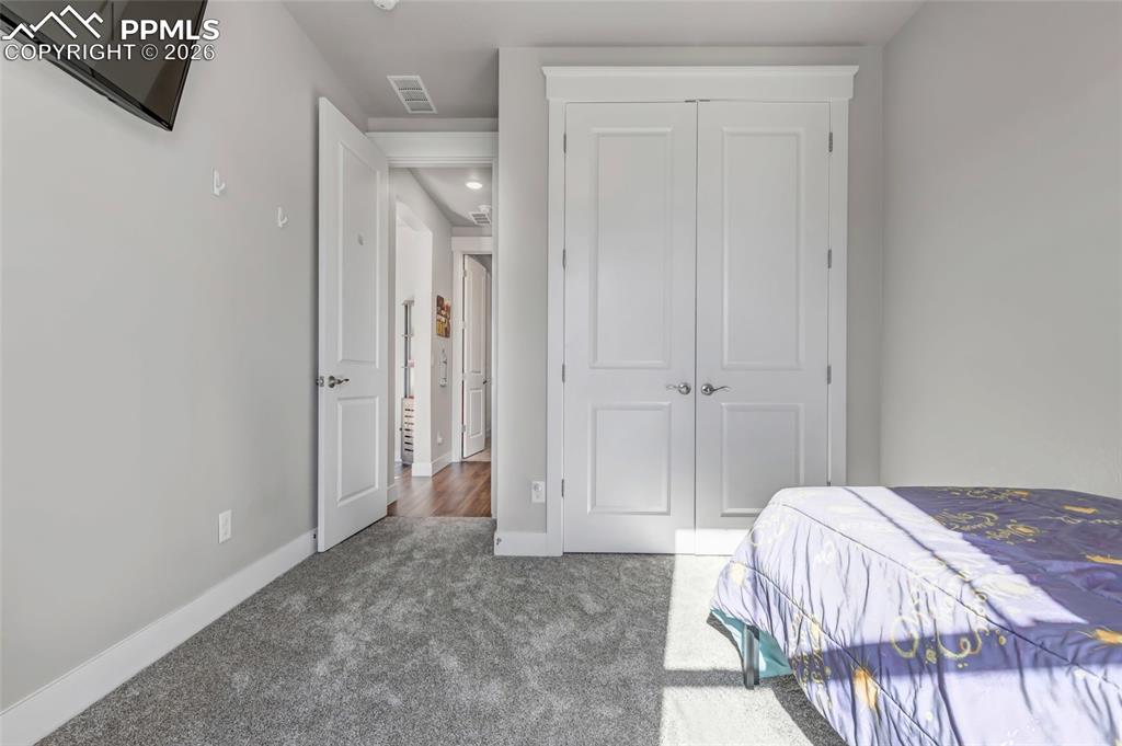 Image 13 of 39: Bedroom