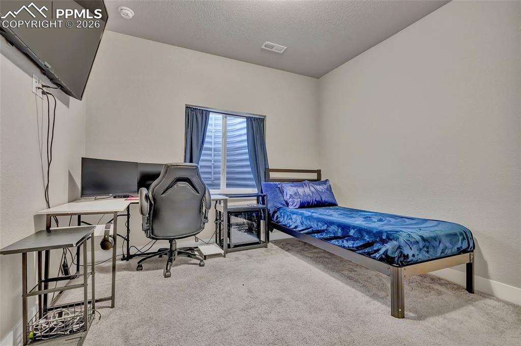 Image 18 of 39: Bedroom