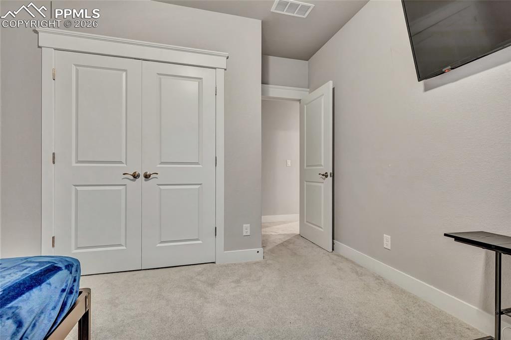 Image 24 of 39: Bedroom