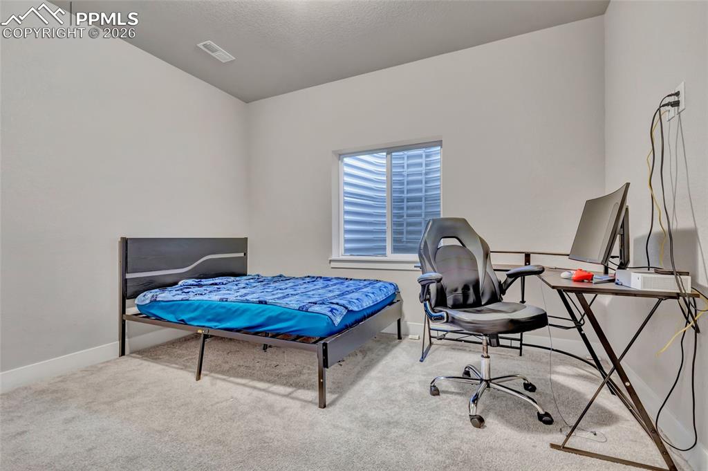 Image 25 of 39: Bedroom