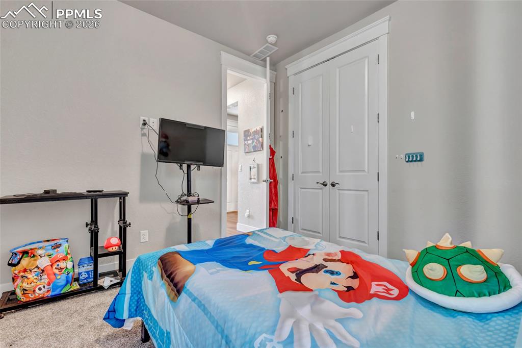 Image 32 of 39: Bedroom