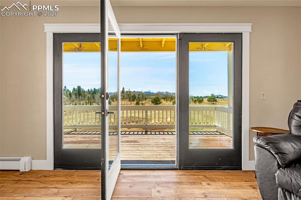 Image 12 of 48: Walk out from main level living room
