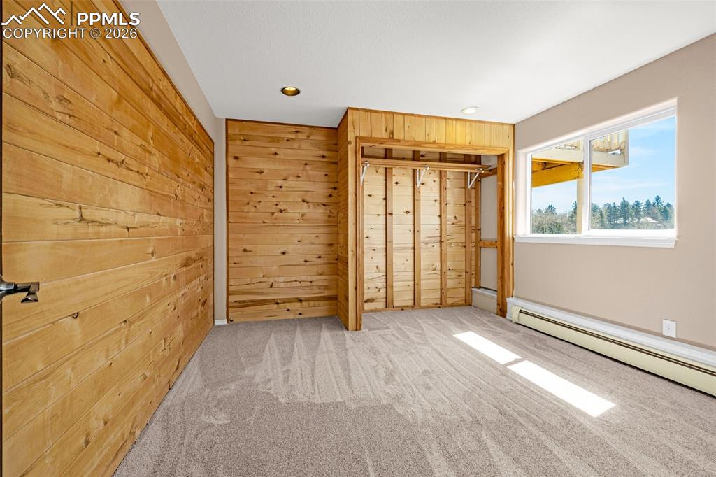 Image 29 of 48: Lower level bedroom