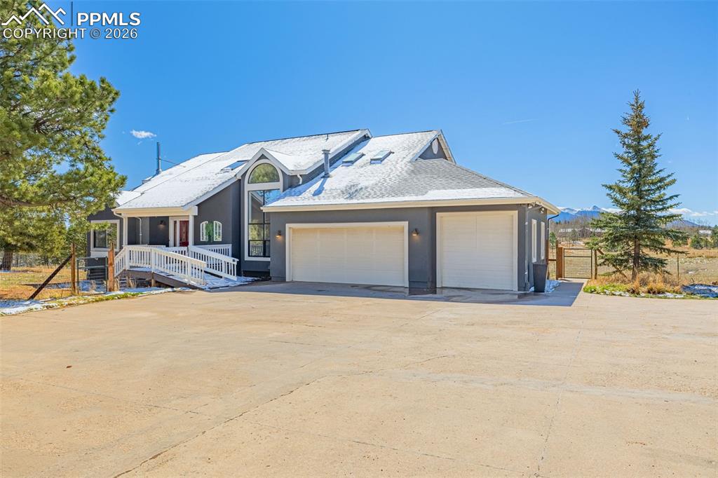 Image 3 of 48: 3 Car Attached Garage