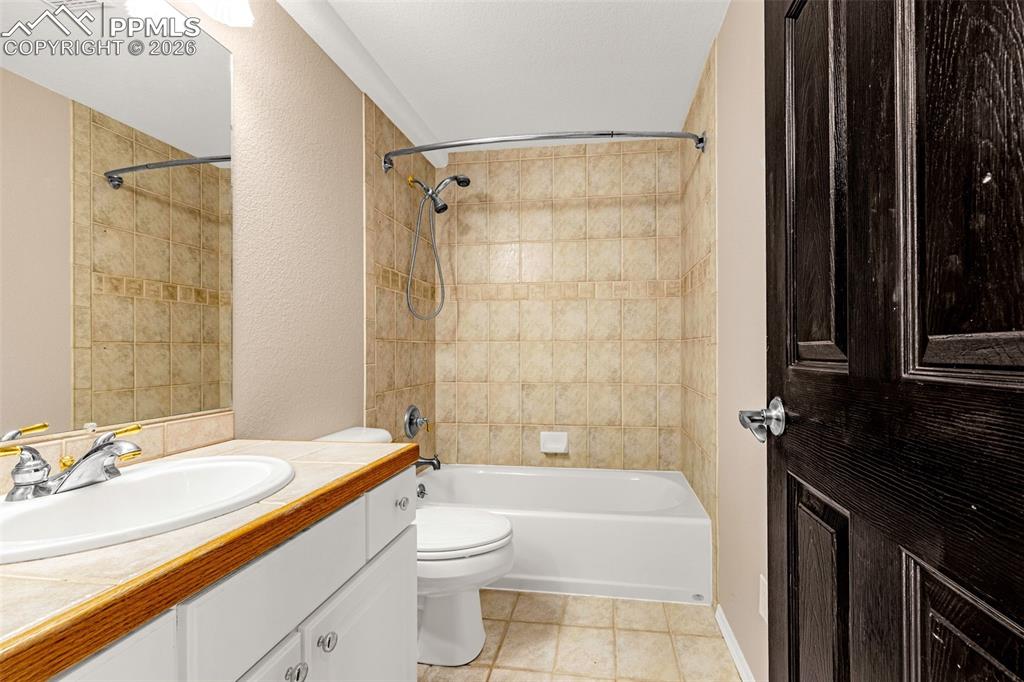 Image 30 of 48: Lower level full bathroom