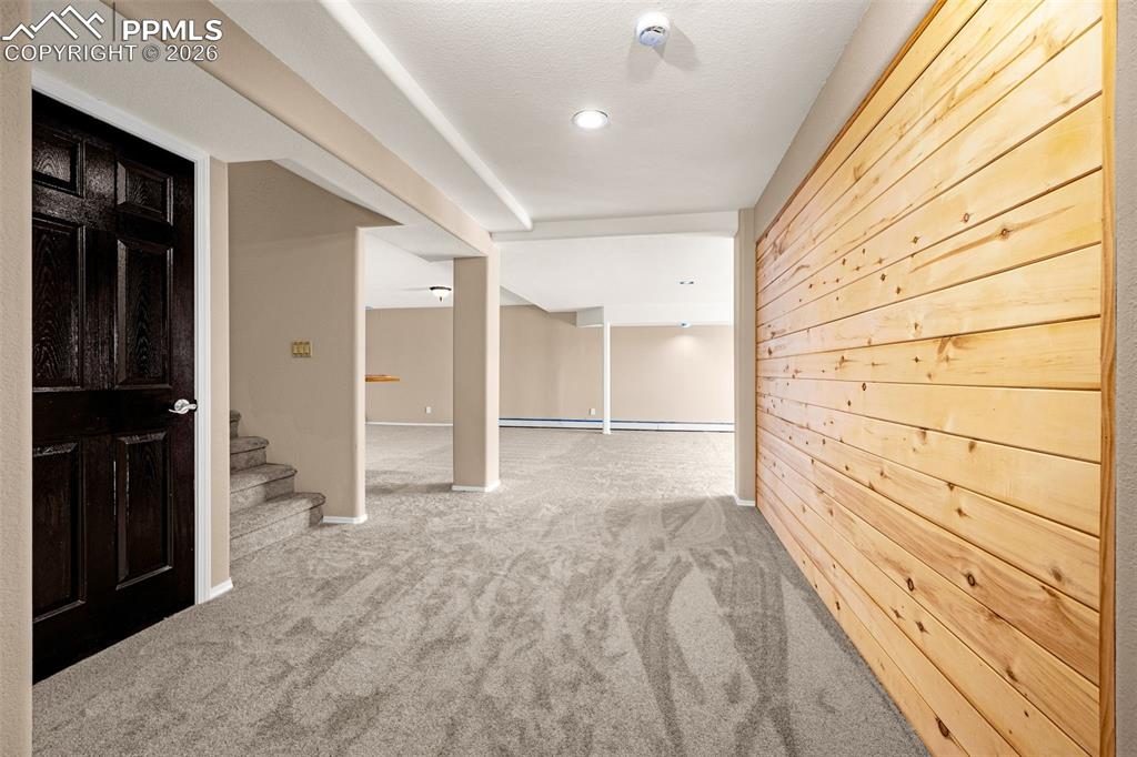 Image 33 of 48: Lower level family room