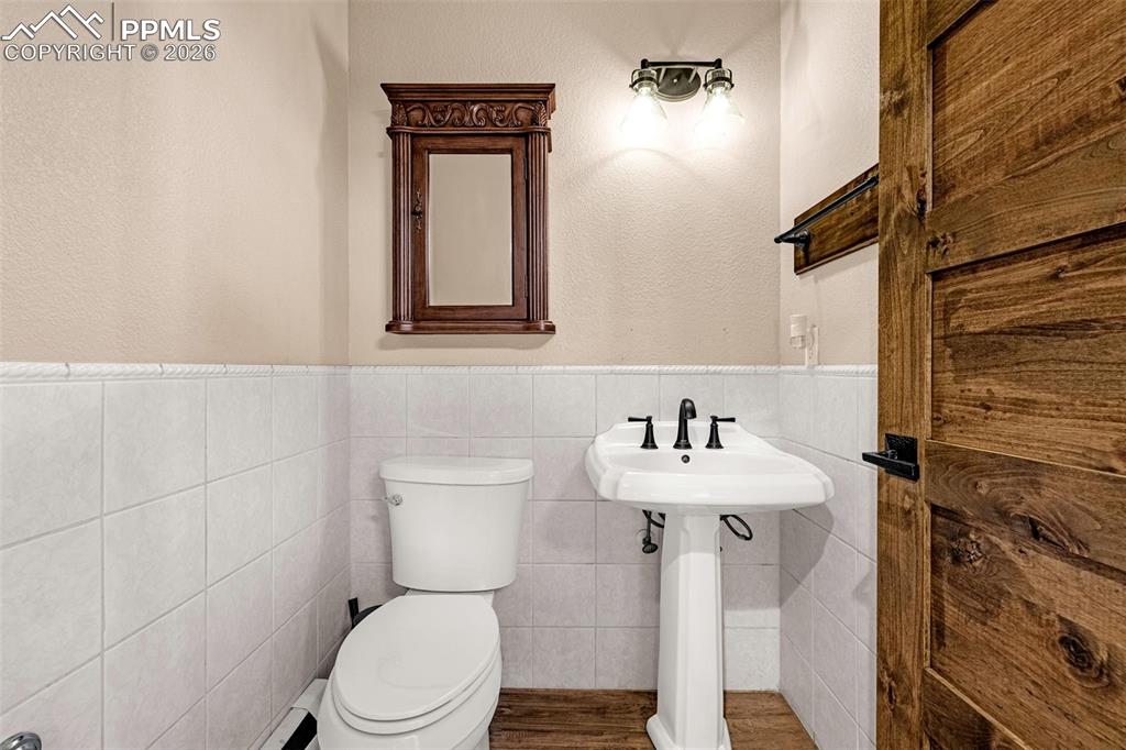 Image 6 of 48: Powder room on main level