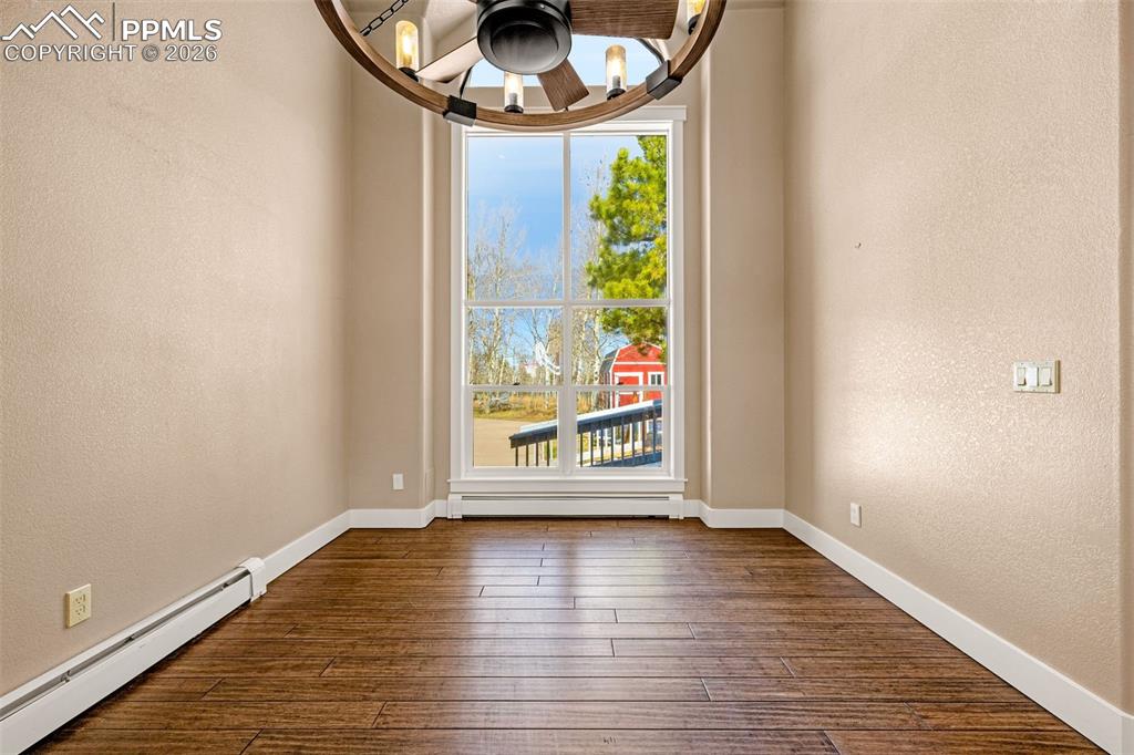 Image 7 of 48: Formal dining room on main level