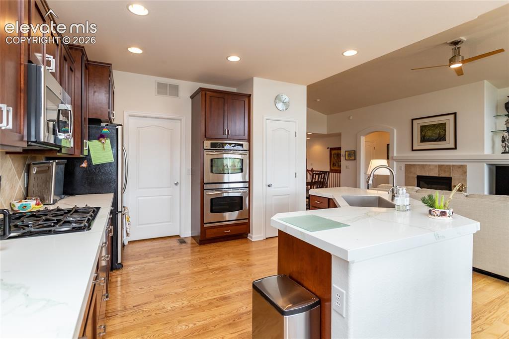 Image 16 of 48: A roomy pantry, plenty of cabinets, lots of storage & prep areas.