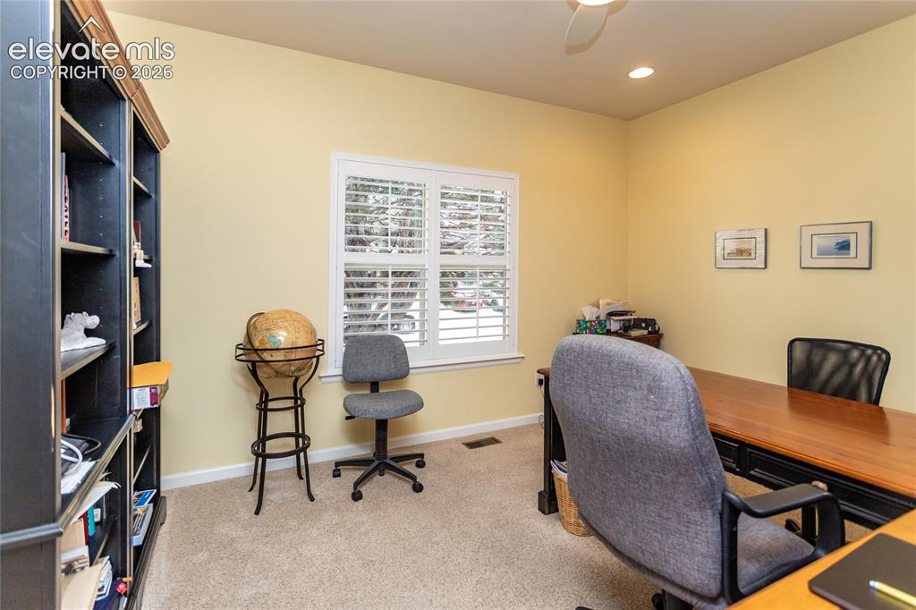 Image 27 of 48: Home office space on the main level.