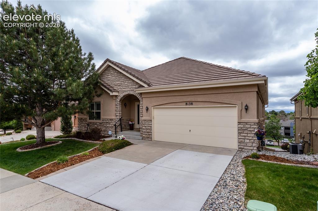 Image 3 of 48: Level driveway, great curb appeal.