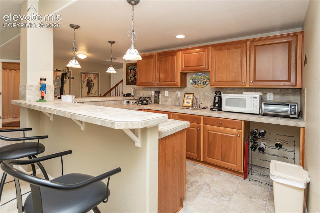 Image 30 of 48: Your family & your guests will enjoy the bar dowstairs.