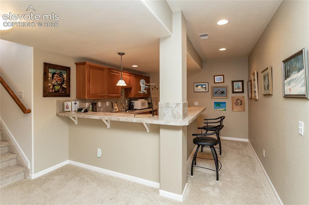 Image 31 of 48: Perfect space to spread out snacks & drinks to watch the big games!