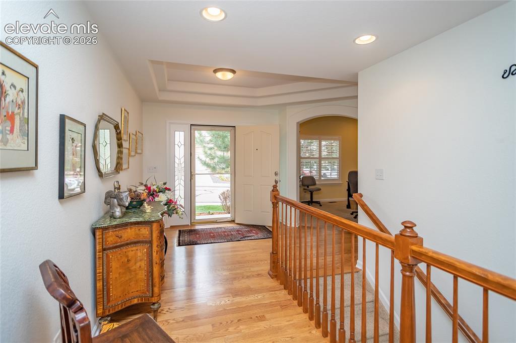 Image 5 of 48: Warm woods, neutral colors...lots of light.