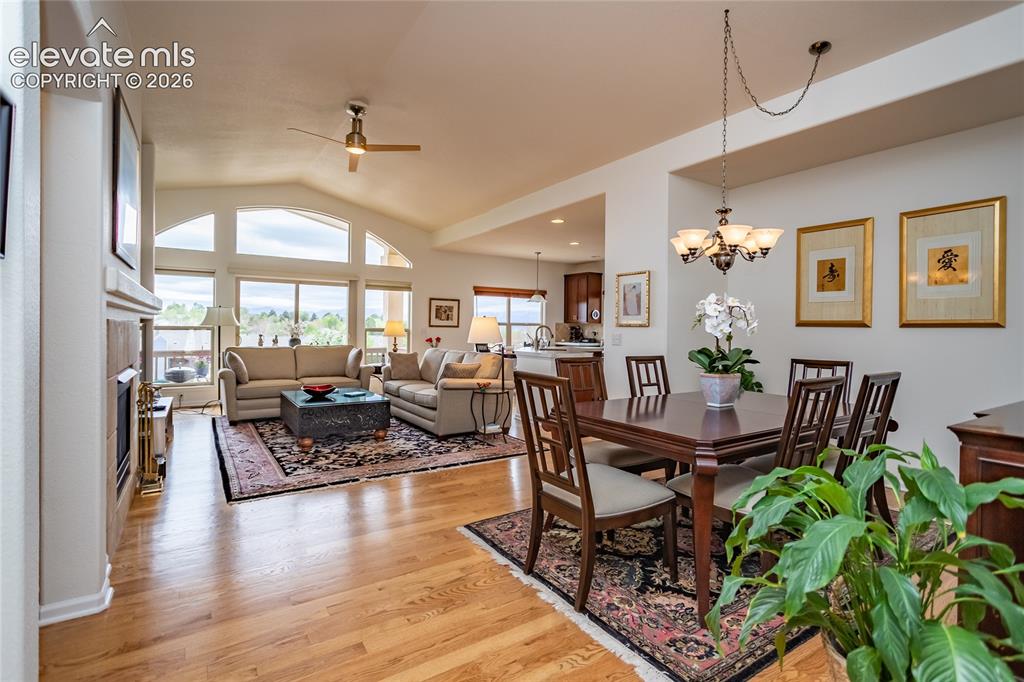 Image 7 of 48: Open concept from dining room to living room to kitchen. Great for enterta