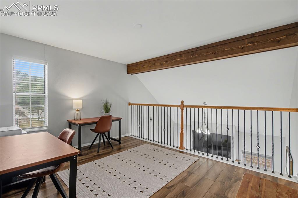 Image 15 of 36: Upper loft provides versatile living space 