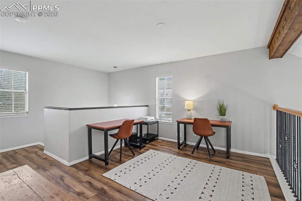 Image 16 of 36: Upper loft provides versatile living space 