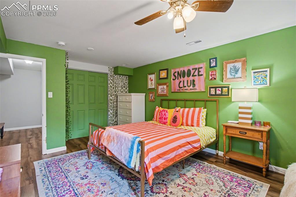 Image 21 of 36: Spacious basement bedroom with garden level window. 