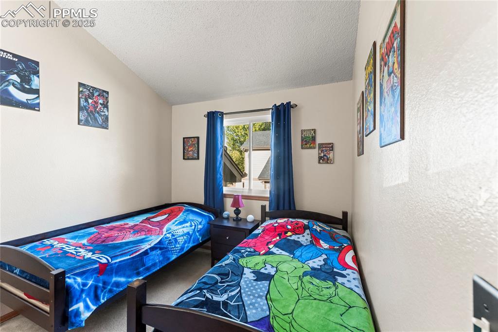 Image 21 of 37: Bedroom