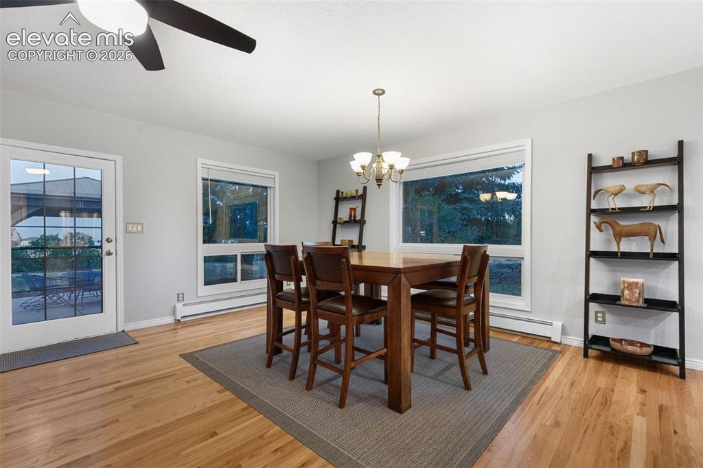 Image 14 of 48: Wide Open Dining area to Living Room