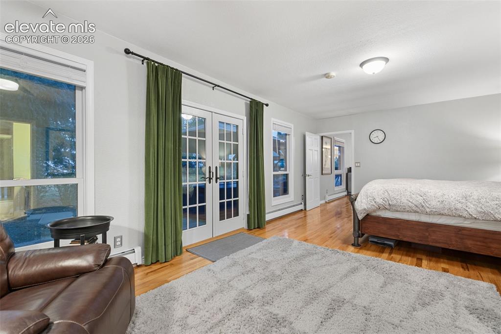 Image 19 of 48: Main Level large Primary Bedroom space