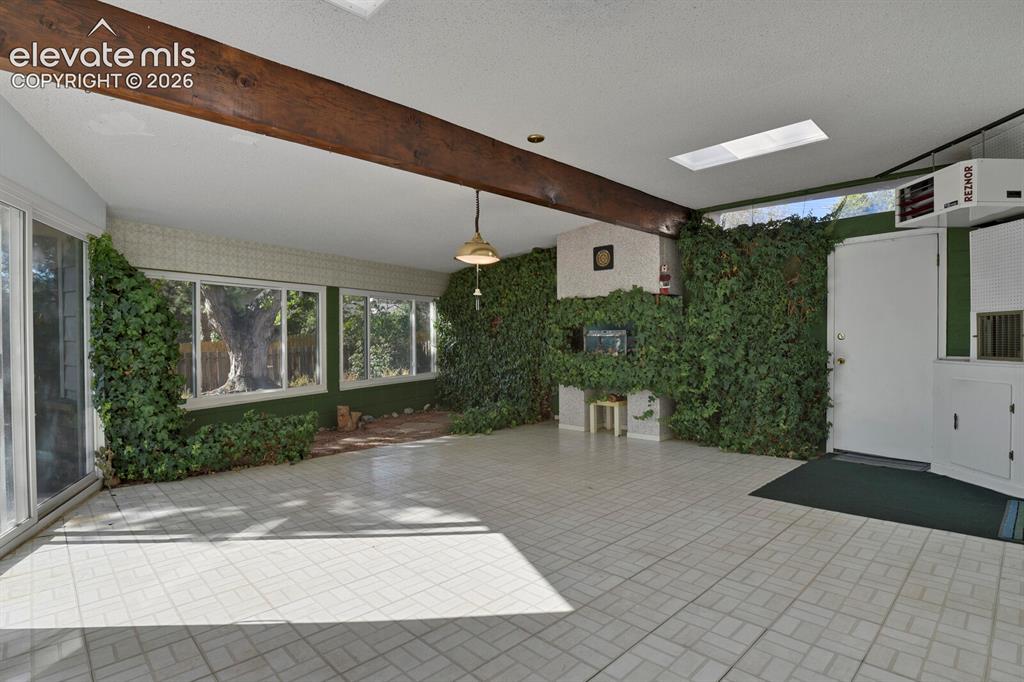 Image 10 of 46: Sun Room