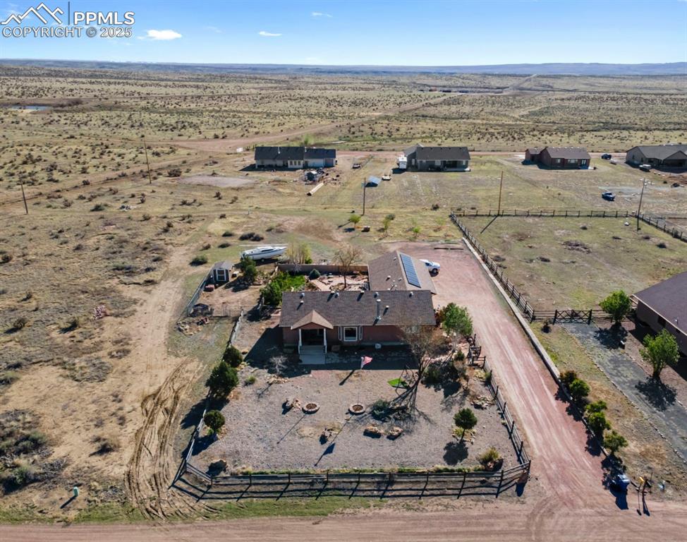 Image 4 of 21: Aerial view with view of desert and a rural view