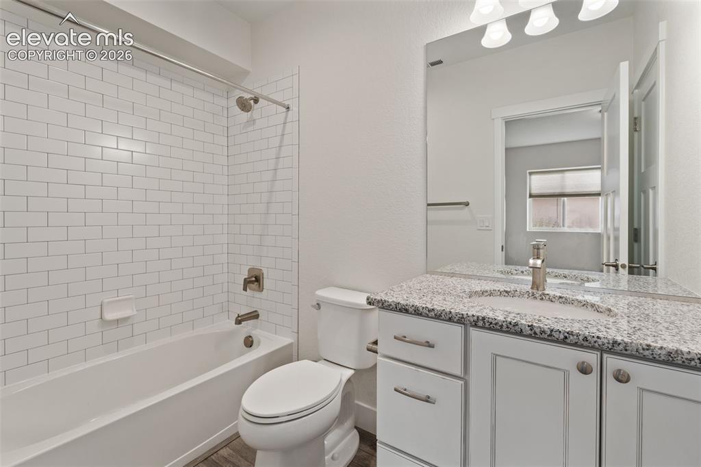 Image 40 of 50: en suite bathroom attached to the basement bedroom