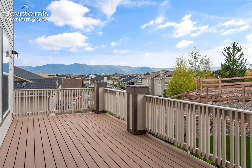 Image 42 of 50: Expansive outdoor deck with composite decking and spectacular mountain view
