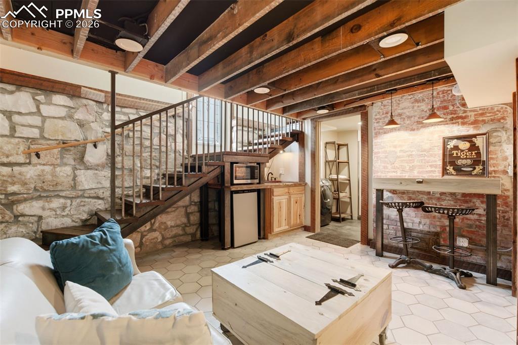 Image 26 of 39: Basement Living Space