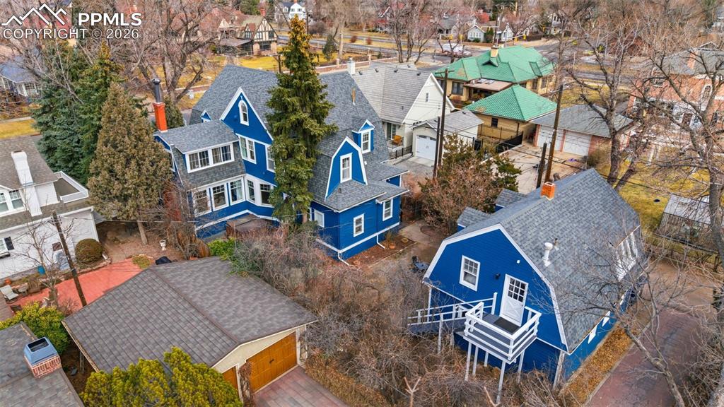 Image 31 of 39: Aerial view of Main House and ADU over Garage