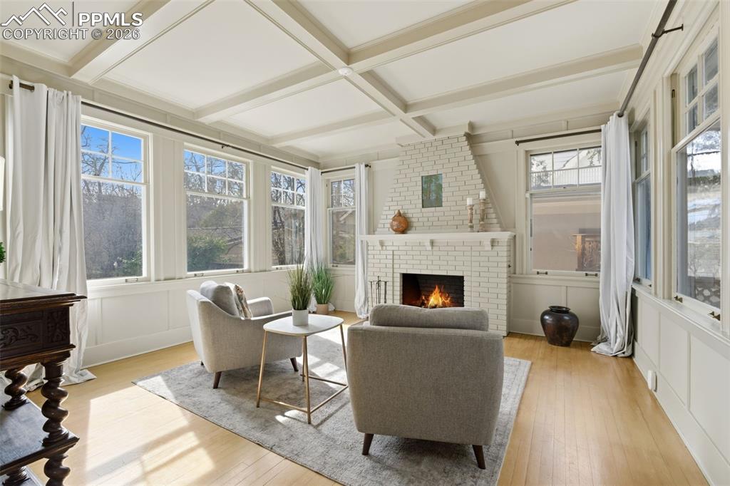 Image 9 of 39: Family Room with Fireplace featuring Van Briggle Accent Tile