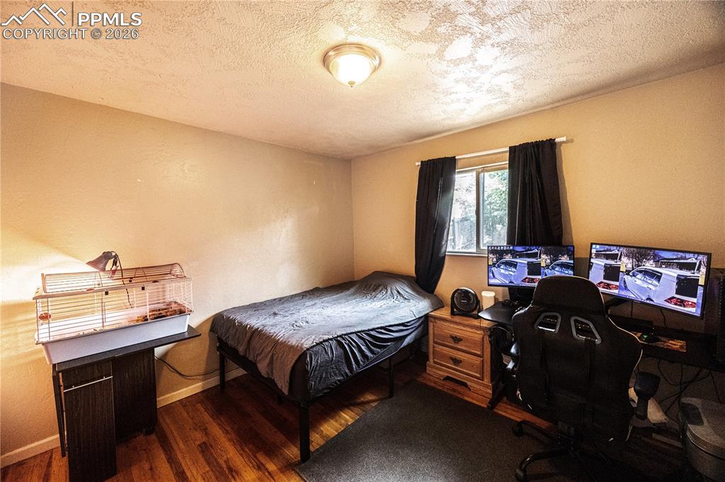 Image 10 of 22: Upstairs second bedroom