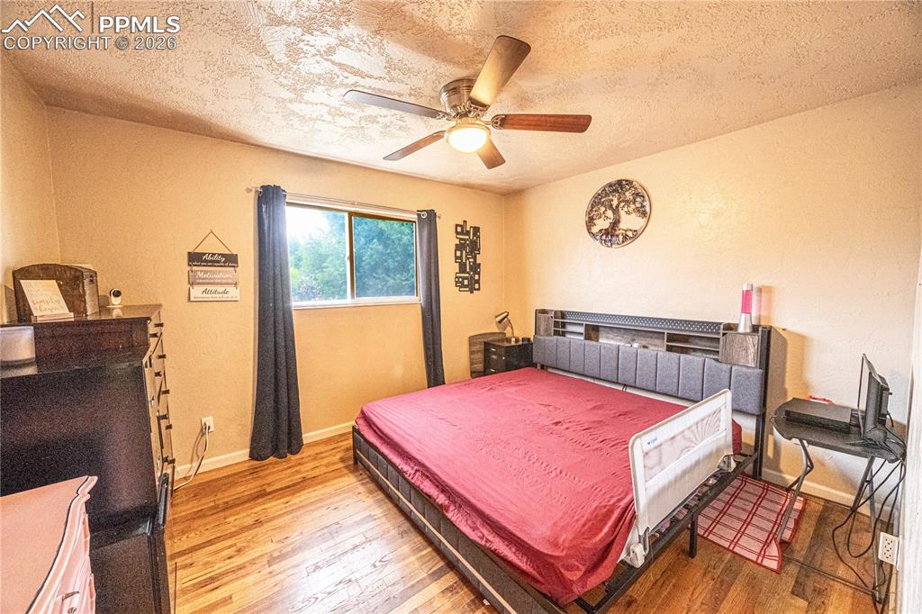 Image 9 of 22: Upstairs primary bedroom, large enough to fit a king with room to spare! 