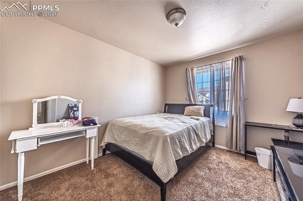 Image 21 of 29: Bedroom