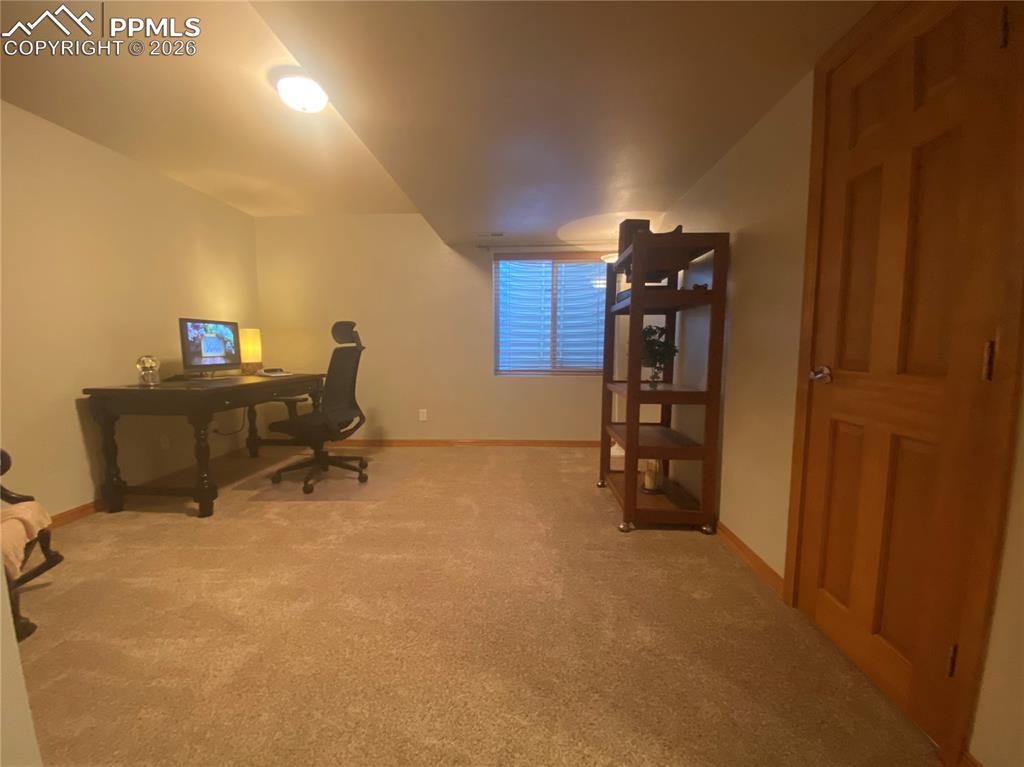 Image 29 of 47: This basement bedroom adjoins the FULL bathroom