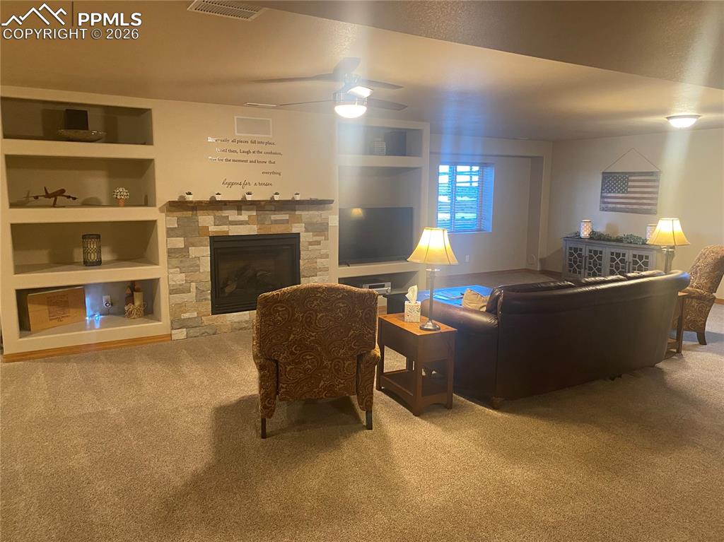 Image 33 of 47: Built-in shelves could support a tv area or knick-knacks & trophies