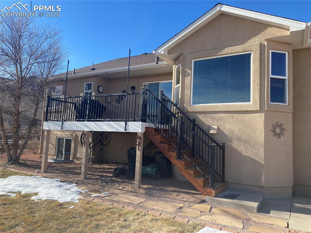 Image 40 of 47: NEW railings match the interior stairway