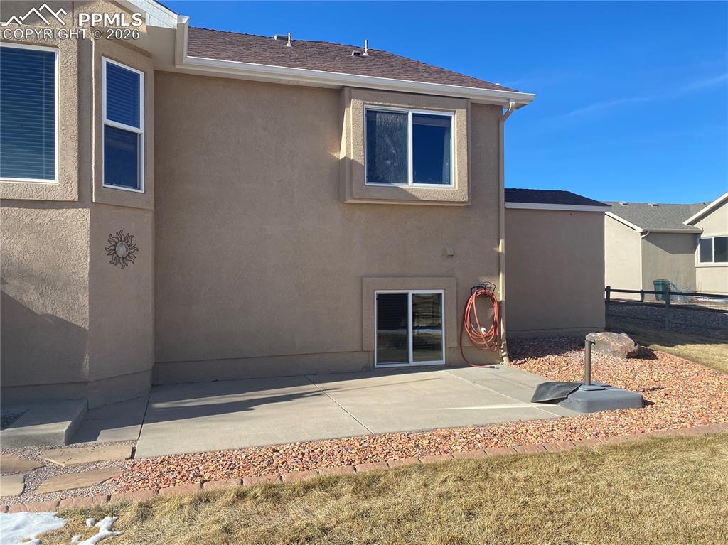 Image 41 of 47: And the lower concrete porch could easily fit a hot tub