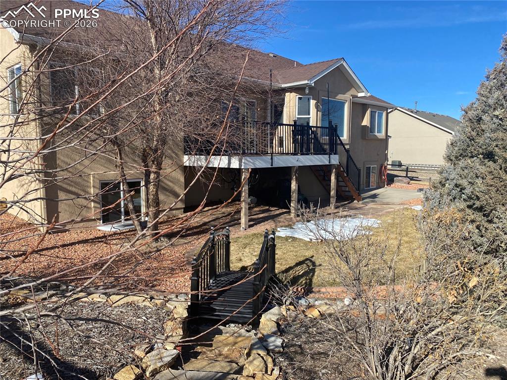 Image 43 of 47: The backyard is fully fenced & everything is nicely landscaped